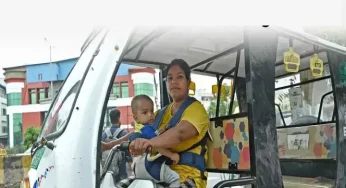Single mother drives e-rickshaw with her son strapped around her in Noida