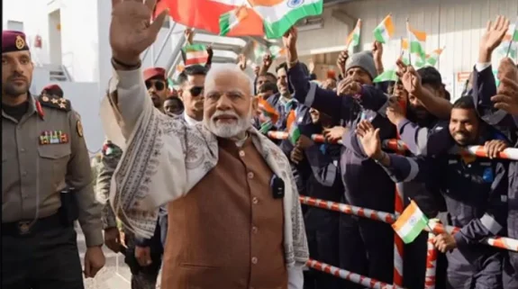 PM Modi interacts with Indian workers at Gulf Spic Labour Camp in Kuwait